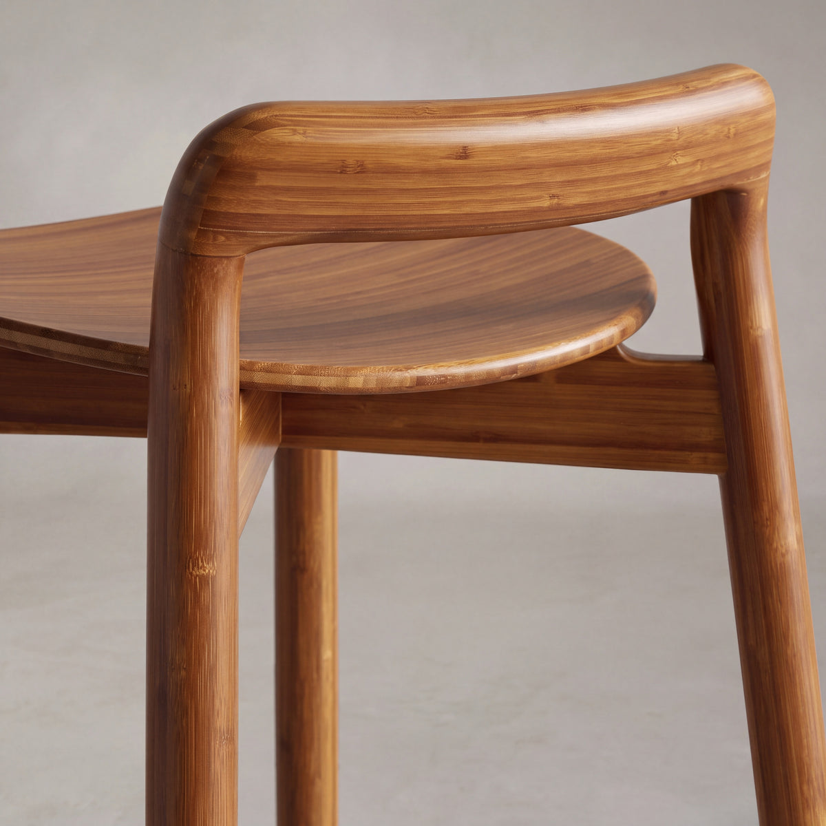 Detail of the backrest on the Greenington Linna Counter Stool in Amber bamboo
