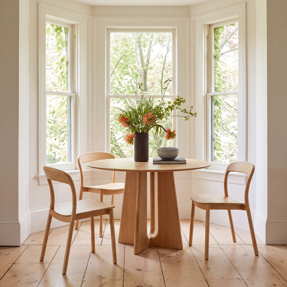 Greenington Luna Dining Table in Wheat bamboo, styled in a dining room