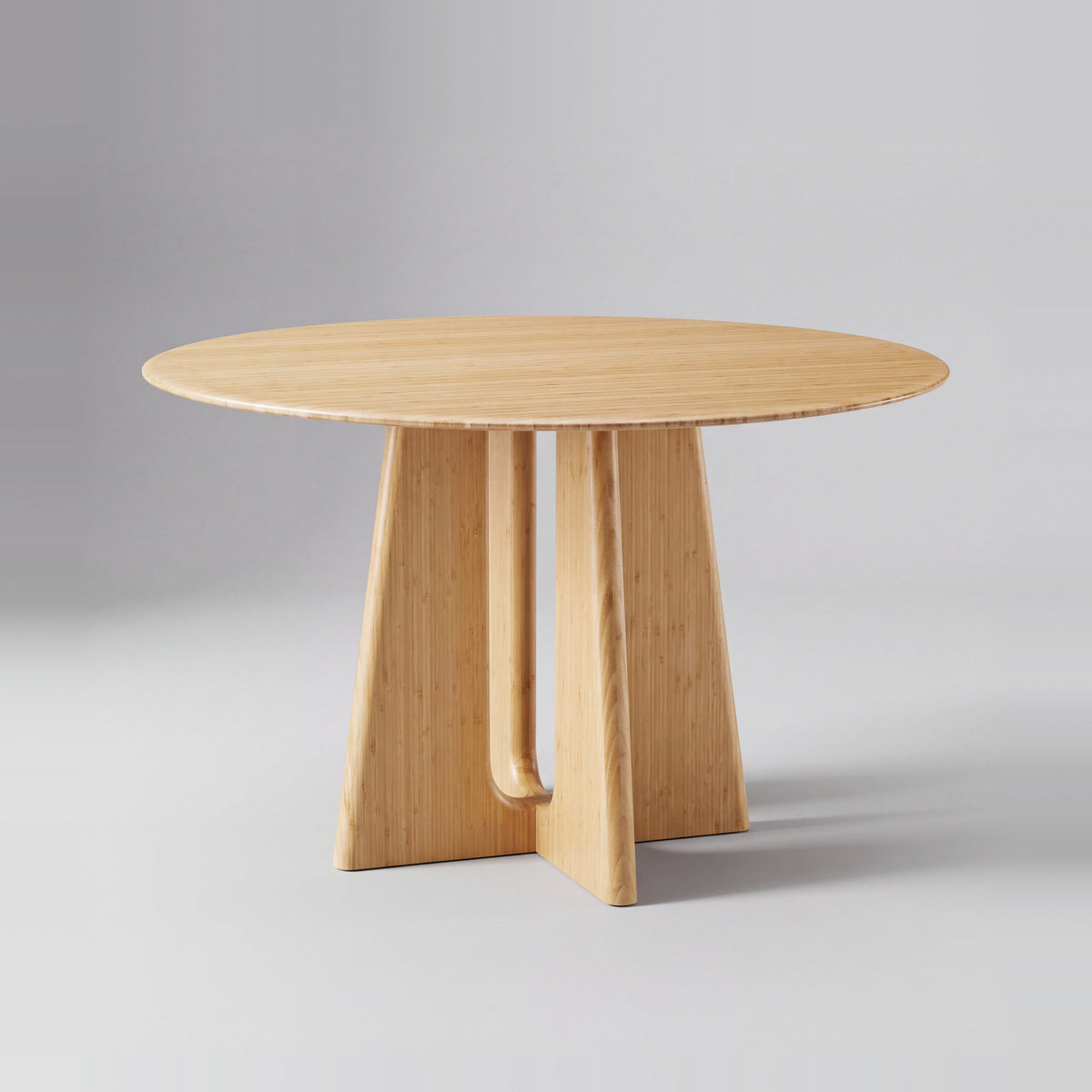Greenington Luna Dining Table in Wheat bamboo, on a studio background