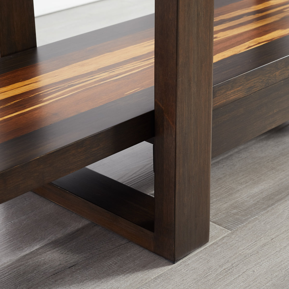 The frame of the Greenington Magnolia Shelf in Black Walnut bamboo, up close