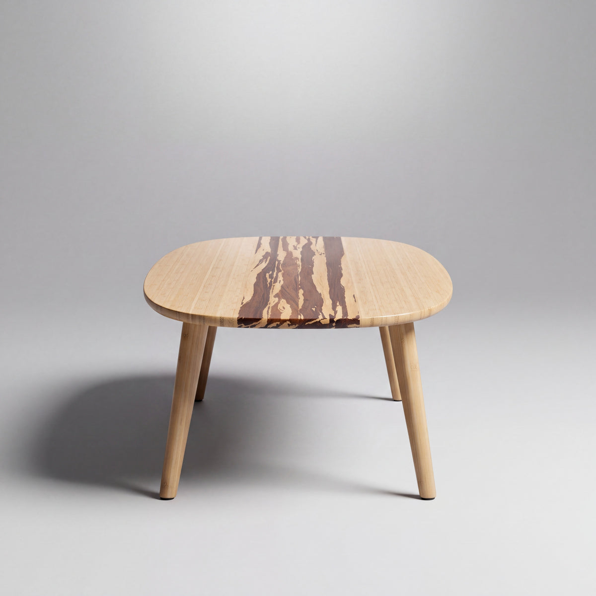 Greenington Malibu Coffee Table in Caramelized bamboo, studio photo on a plain background