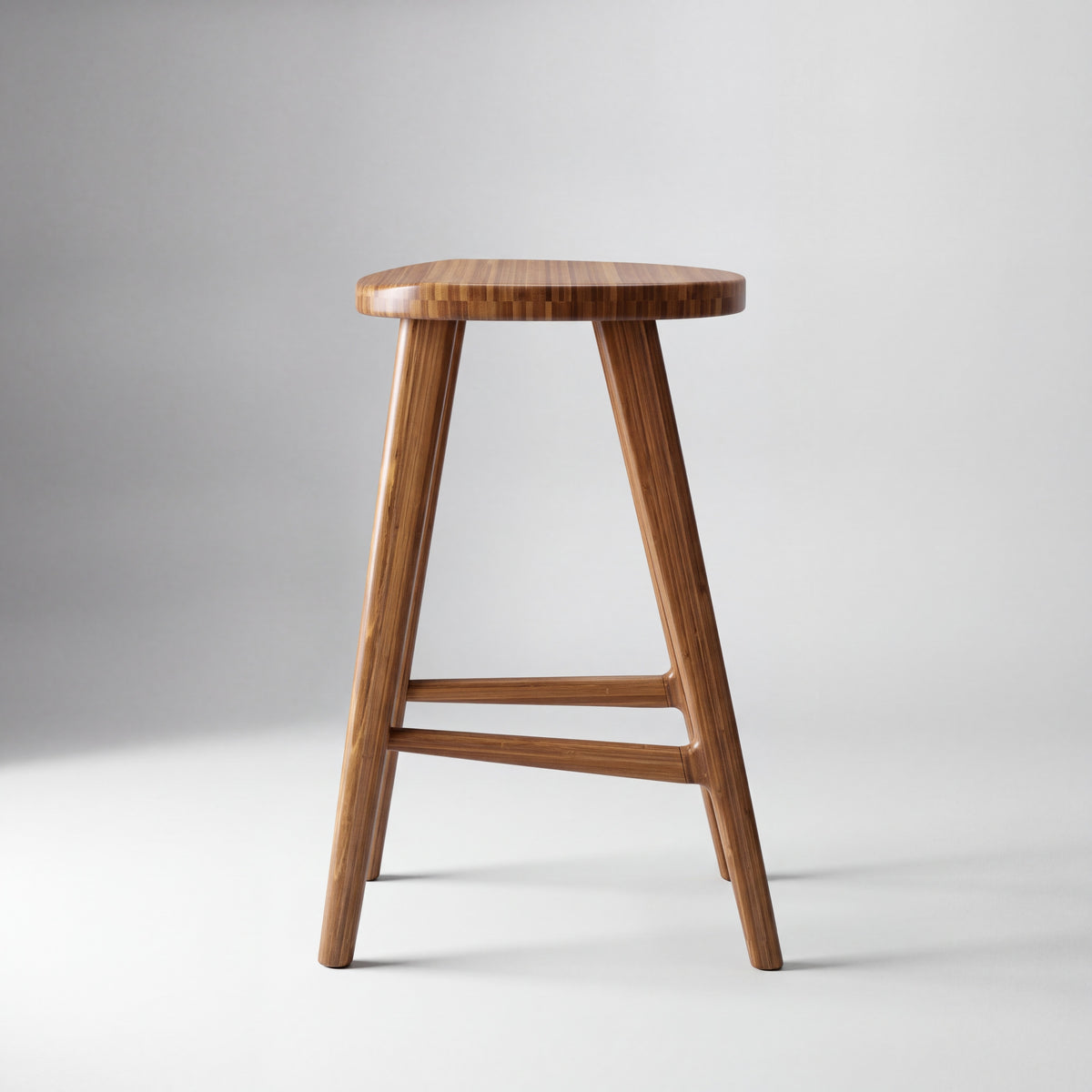 Greenington Max Counter Stool in Amber bamboo, on a studio background