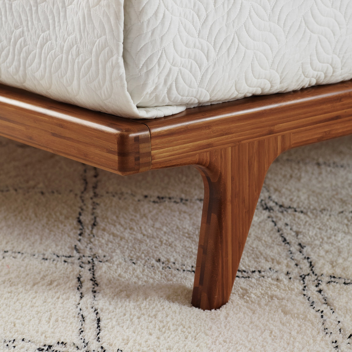 Close-up of the frame on the Greenington Mercury Platform Bed in Amber bamboo