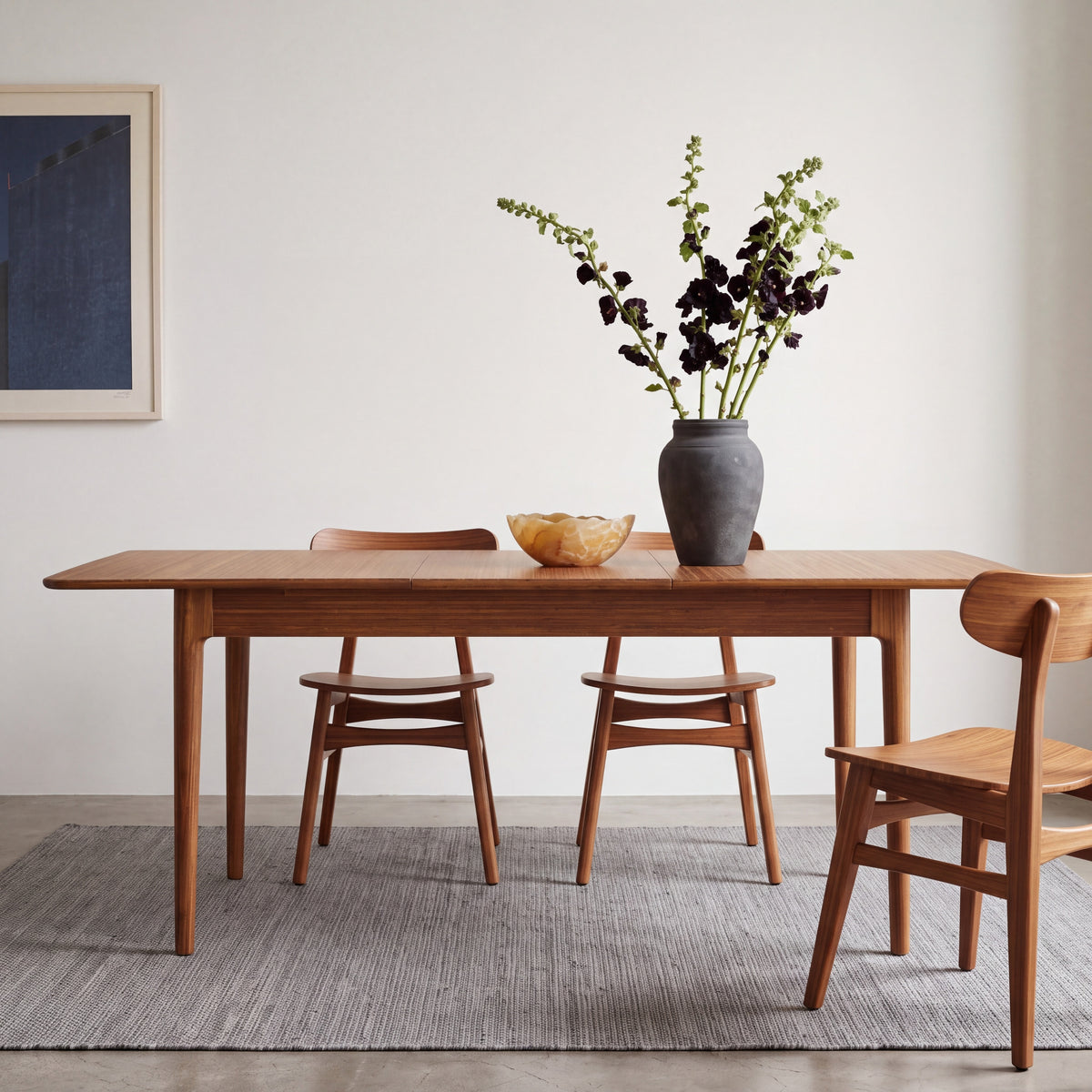 Greenington Mija Dining Table in Amber bamboo, pictured in a dining room