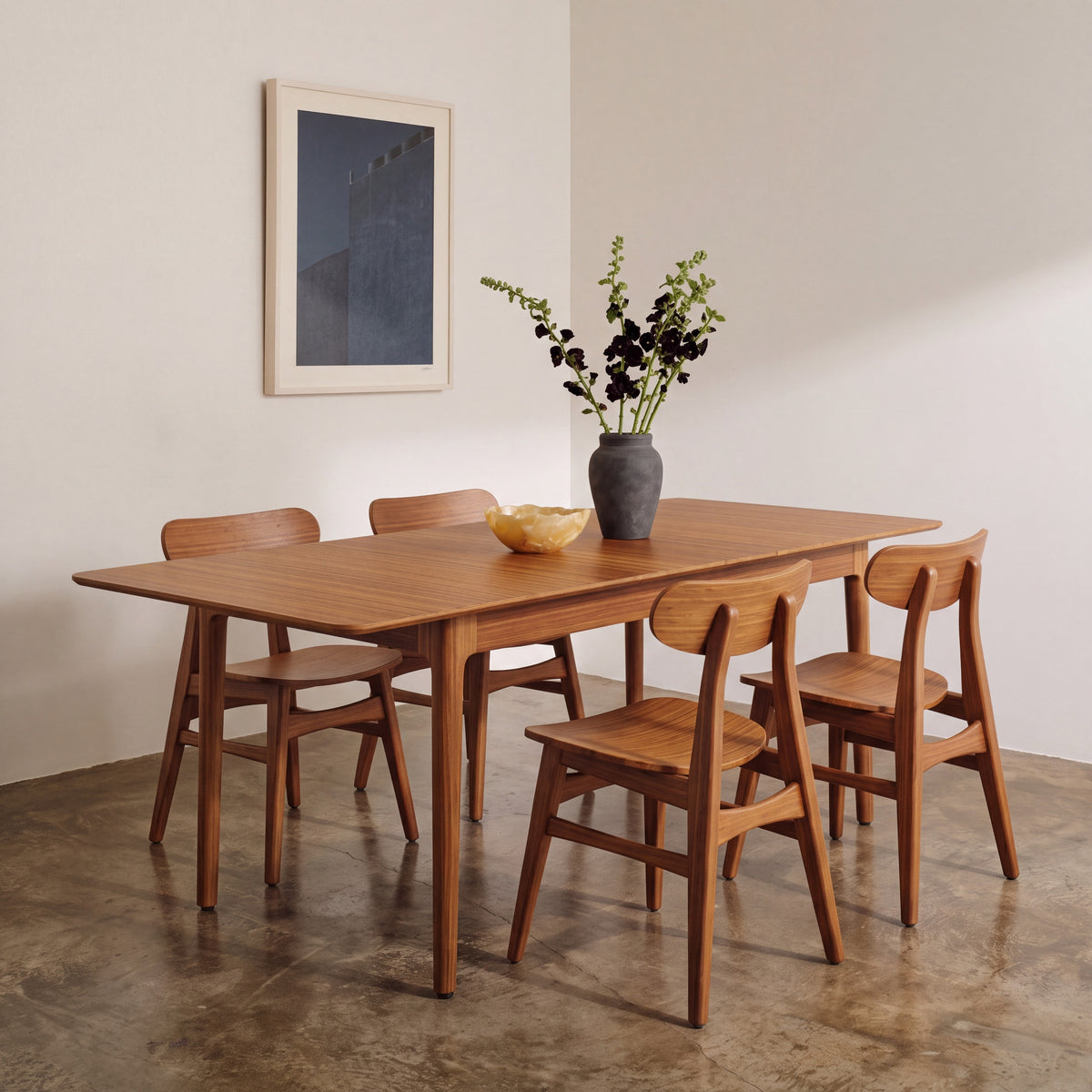 Greenington Mija Dining Table in Amber bamboo, shown in a dining room