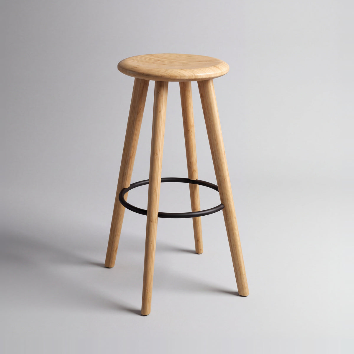 Greenington Mimosa Bar Stool in Caramelized bamboo, on a studio background