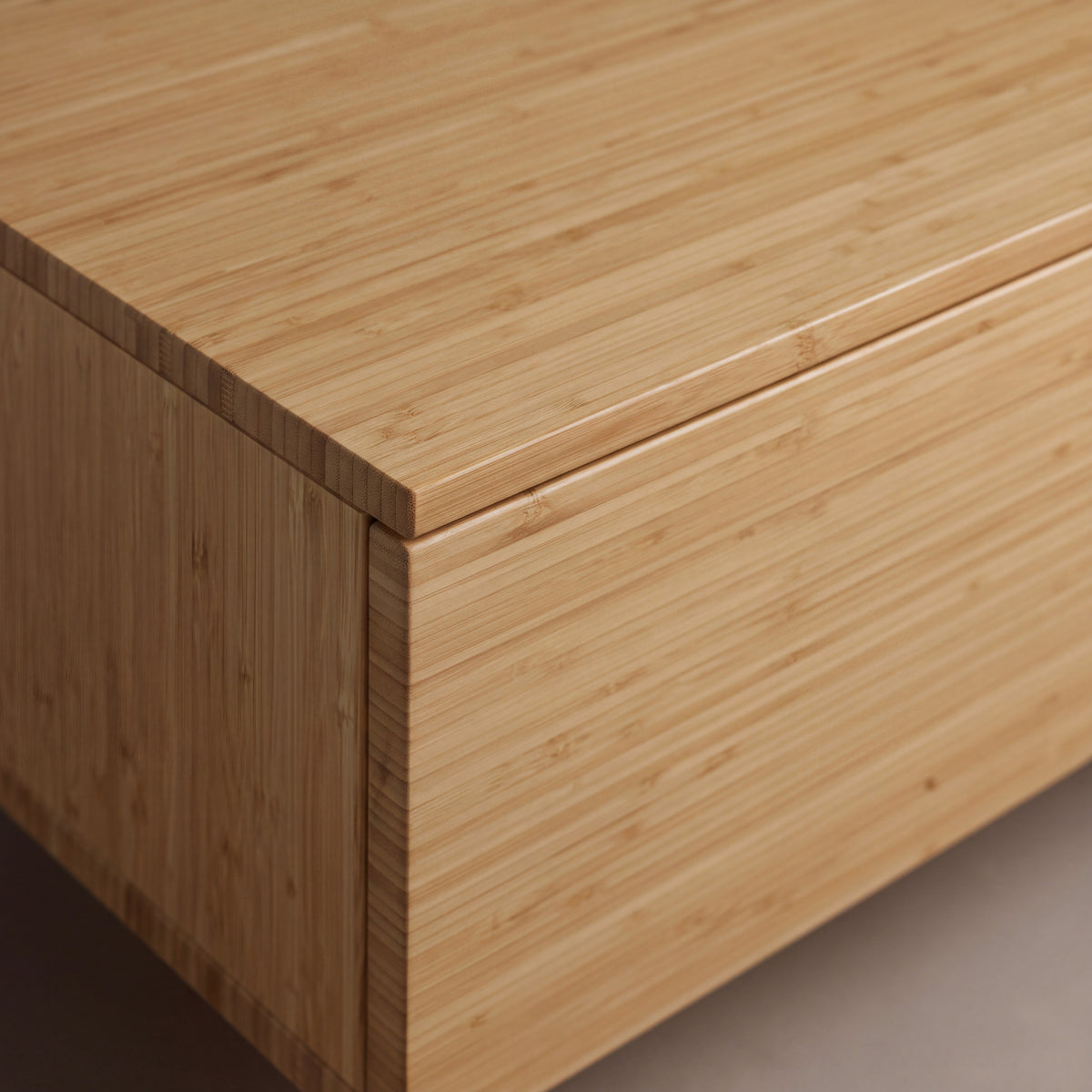 Close-up of the top and bamboo grain on the Greenington Monterey Nightstand in Wheat bamboo