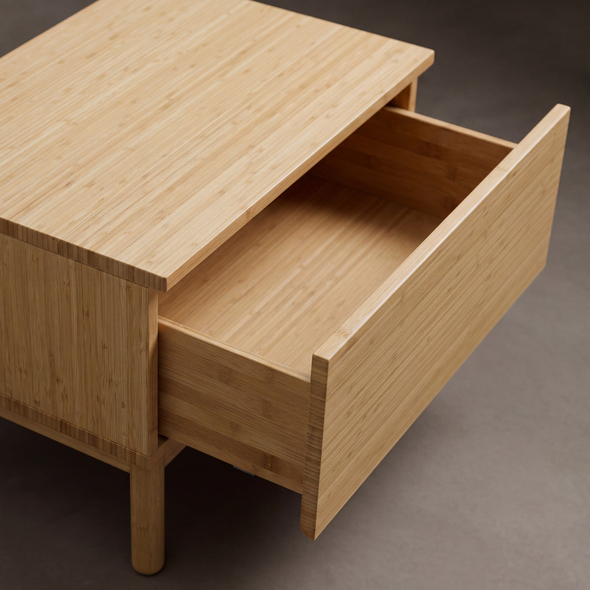 Close-up of the drawer and pull on the Greenington Monterey Nightstand in Wheat bamboo