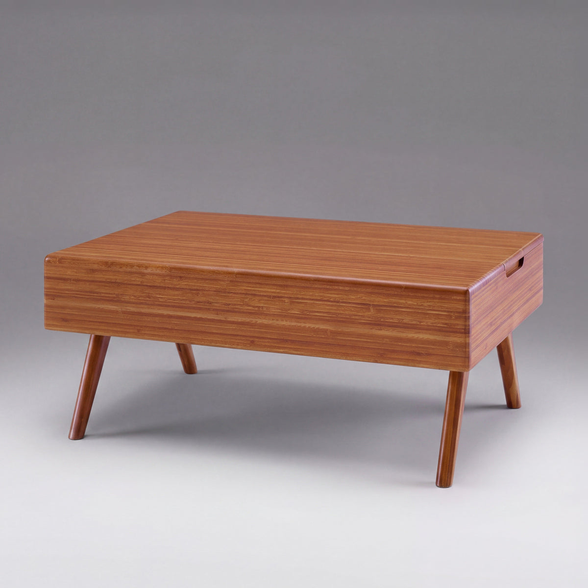 Greenington Rhody Lift Top Coffee Table in Amber bamboo, on a studio background