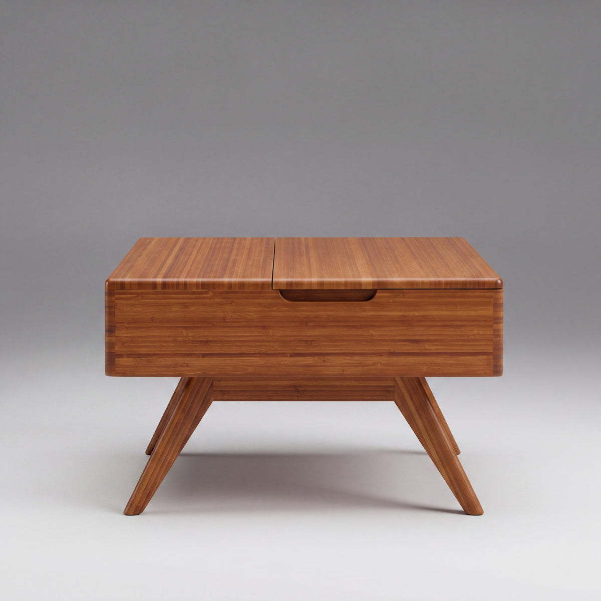 Greenington Rhody Lift Top Coffee Table in Amber bamboo, studio photo on a plain background
