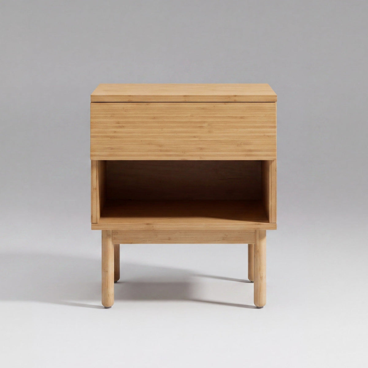 Greenington Ria Nightstand in Caramelized bamboo, on a studio background