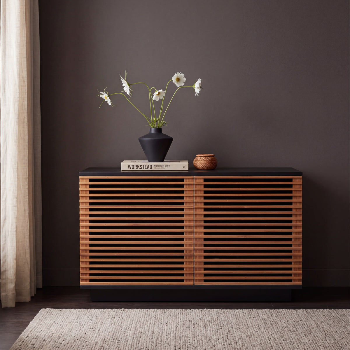 Greenington Rowan Media Center (48") in Amber bamboo, styled in a living room