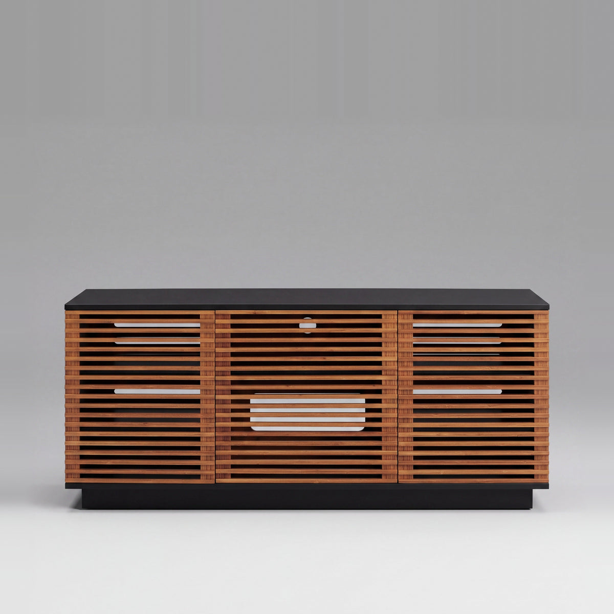 Greenington Rowan Media Center (64") in Amber bamboo, on a studio background