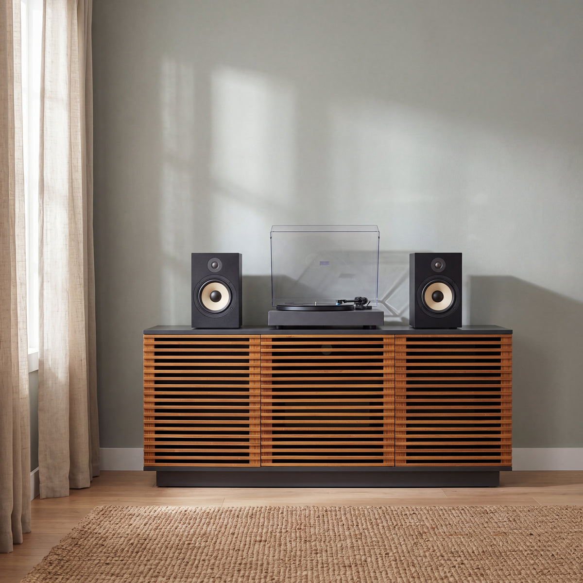 Greenington Rowan Media Center (64") in Amber bamboo, shown in a living room