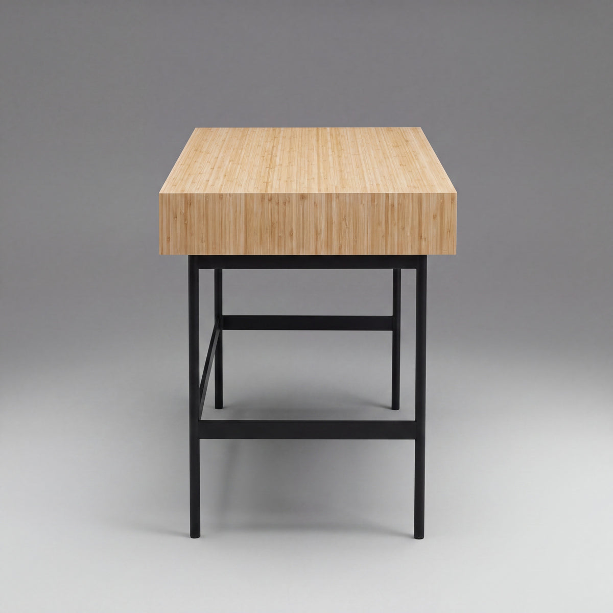 Greenington Santa Cruz Writing Desk in Wheat bamboo, studio photo on a plain background