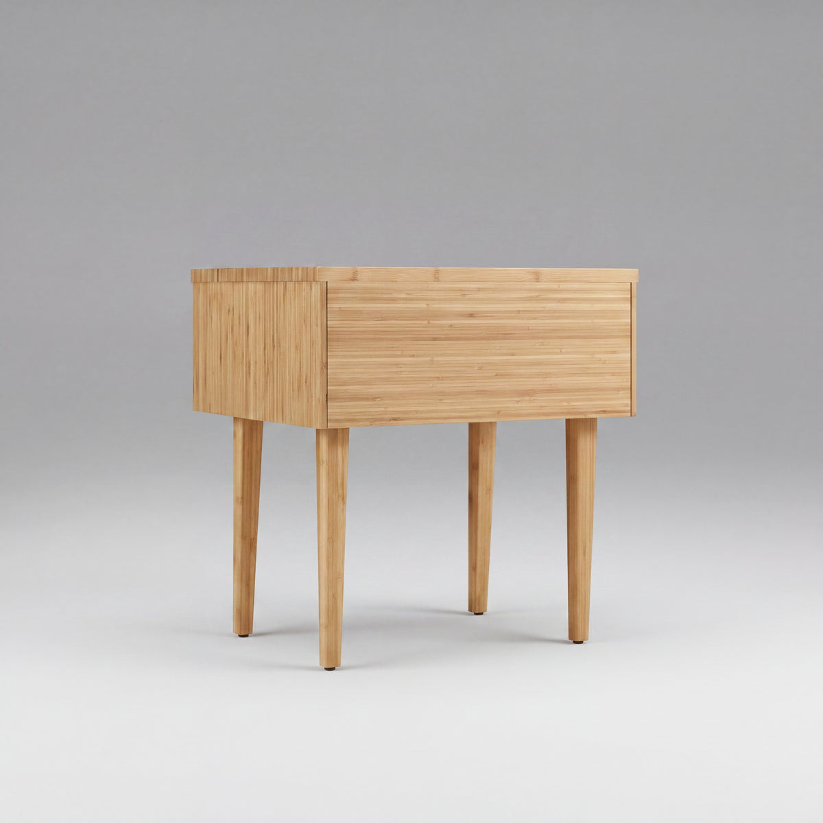 Greenington Sienna Nightstand in Caramelized bamboo, on a studio background