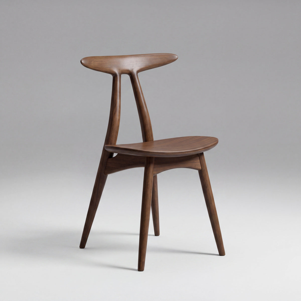 Skagen open-back sculptural chair in Black Walnut