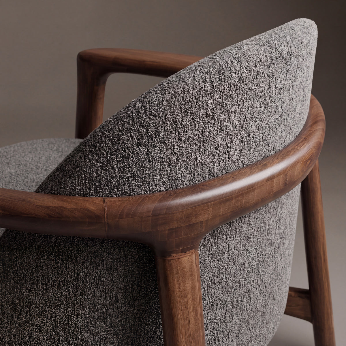 Close-up of the backrest on the Greenington Skylar Lounge Chair in Black Walnut bamboo with Forest fabric