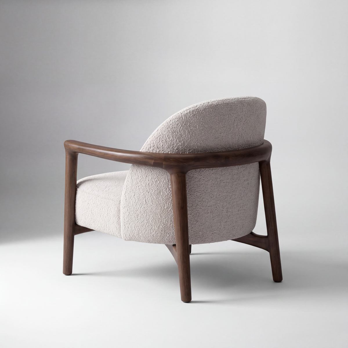 Greenington Skylar Lounge Chair in Black Walnut bamboo with Pearl fabric, on a studio background