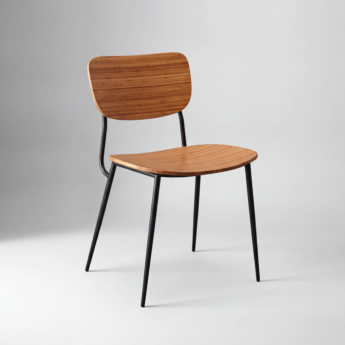 Greenington Soho Dining Chair in Amber bamboo, on a studio background