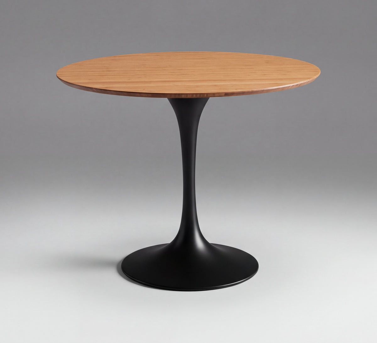 Greenington Soho Dining Table in Amber bamboo, on a studio background