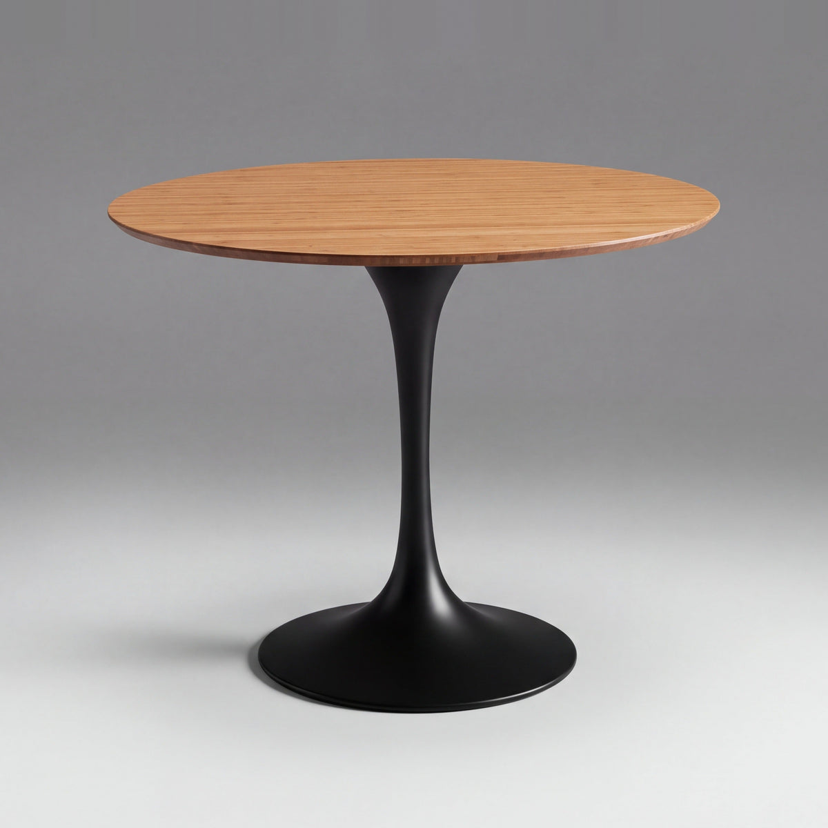 Greenington Soho Dining Table in Amber bamboo, on a studio background