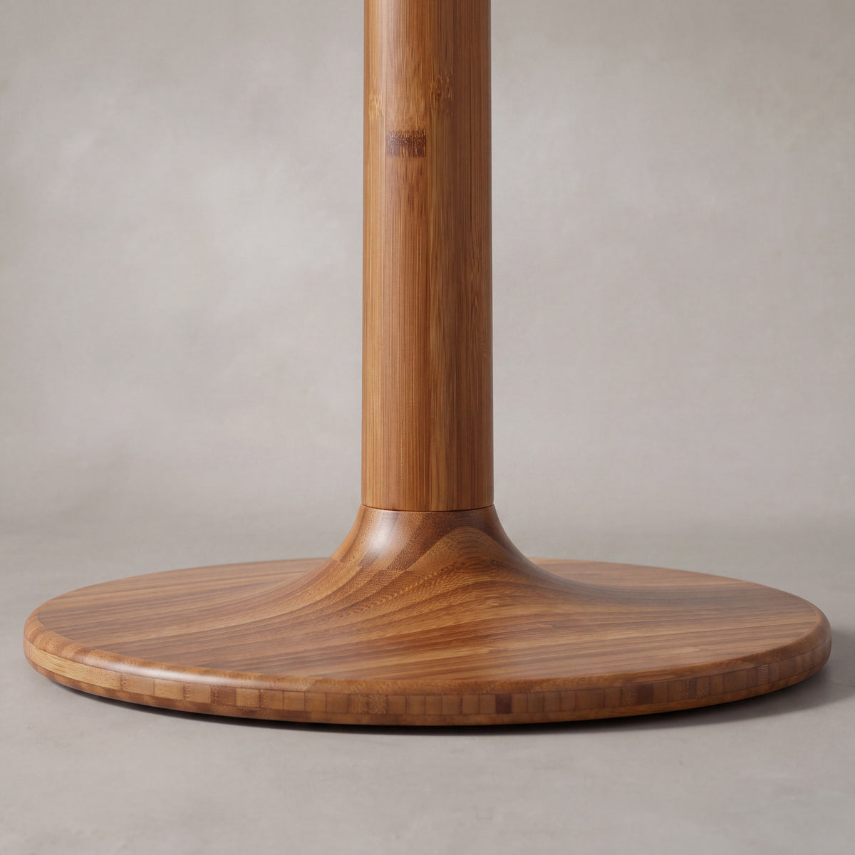 Close-up of the base on the Greenington Sol Side Table in Amber bamboo