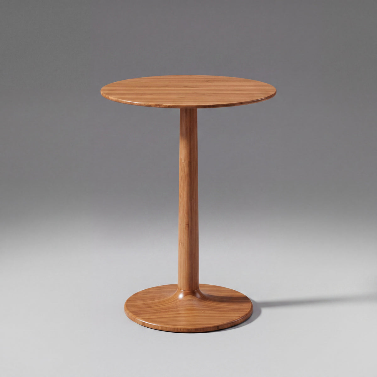 Greenington Sol Side Table in Amber bamboo, on a studio background