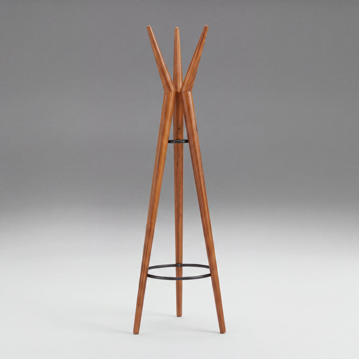 Greenington Spire Coat Tree in solid bamboo, on a studio background