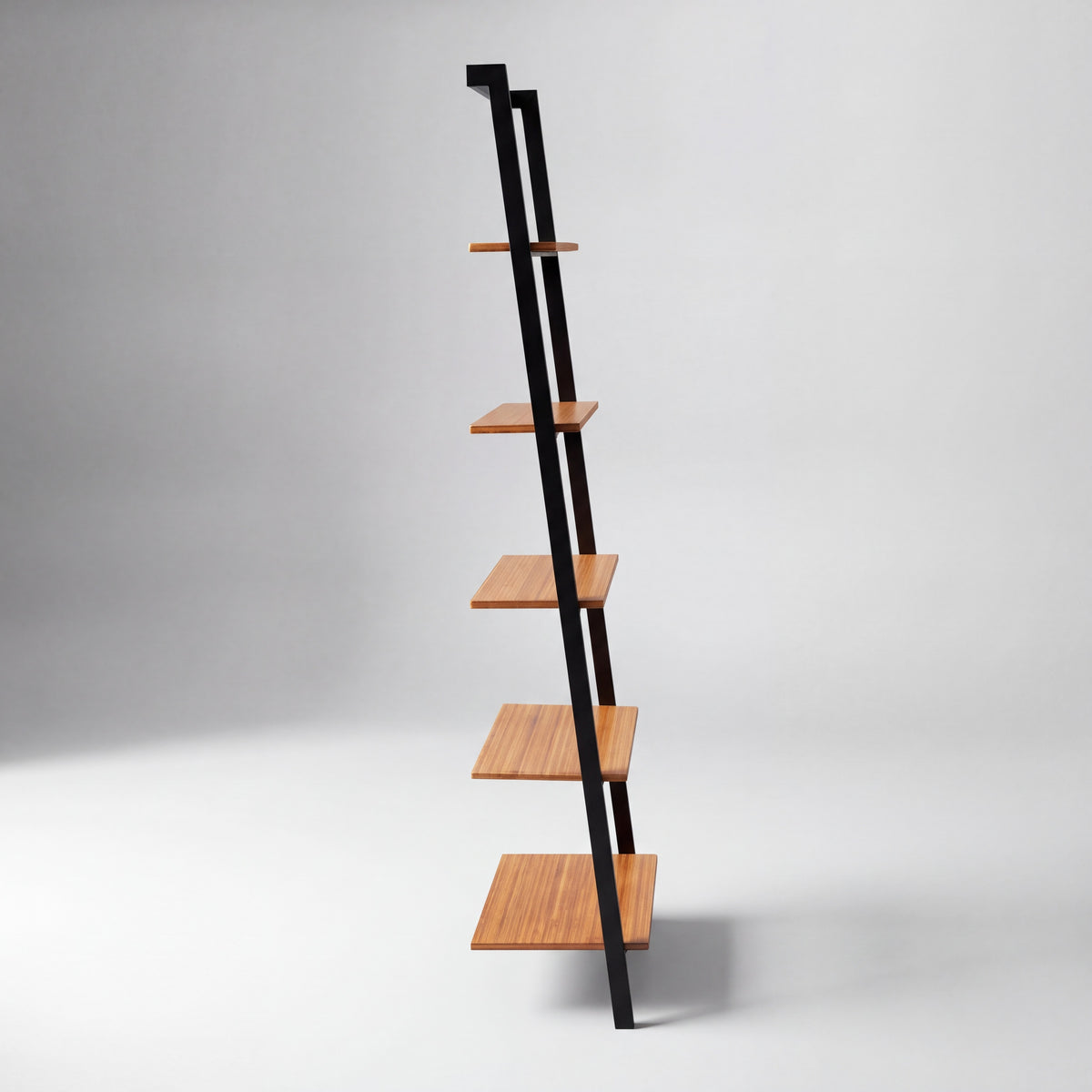 Greenington Studio Plus Leaning Shelf in Amber bamboo, studio photo on a plain background