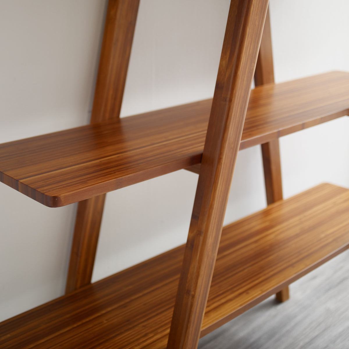 Close-up of the shelves on the Greenington Studio Plus Shelf in Amber bamboo