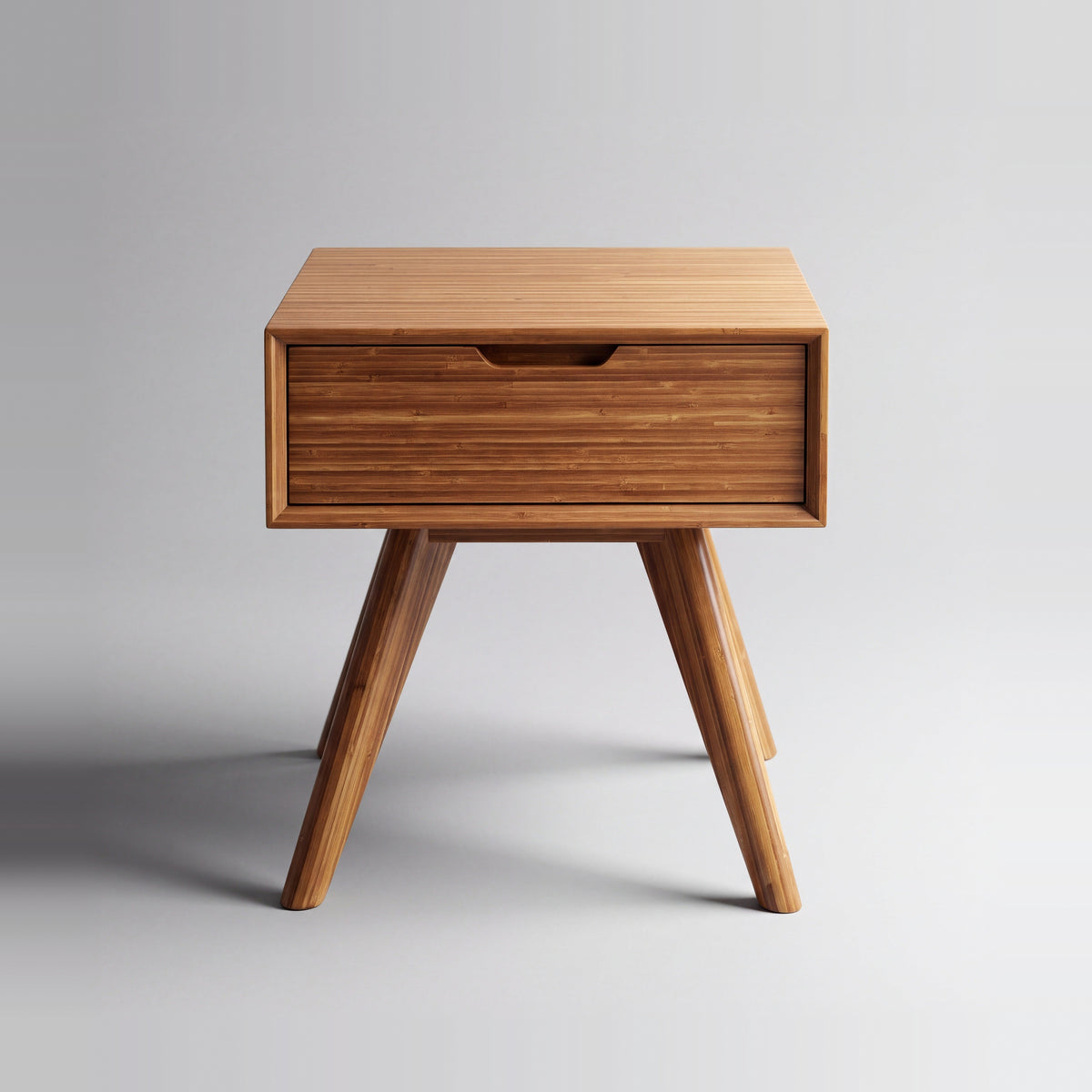 Greenington Summit Nightstand in Amber bamboo, on a studio background