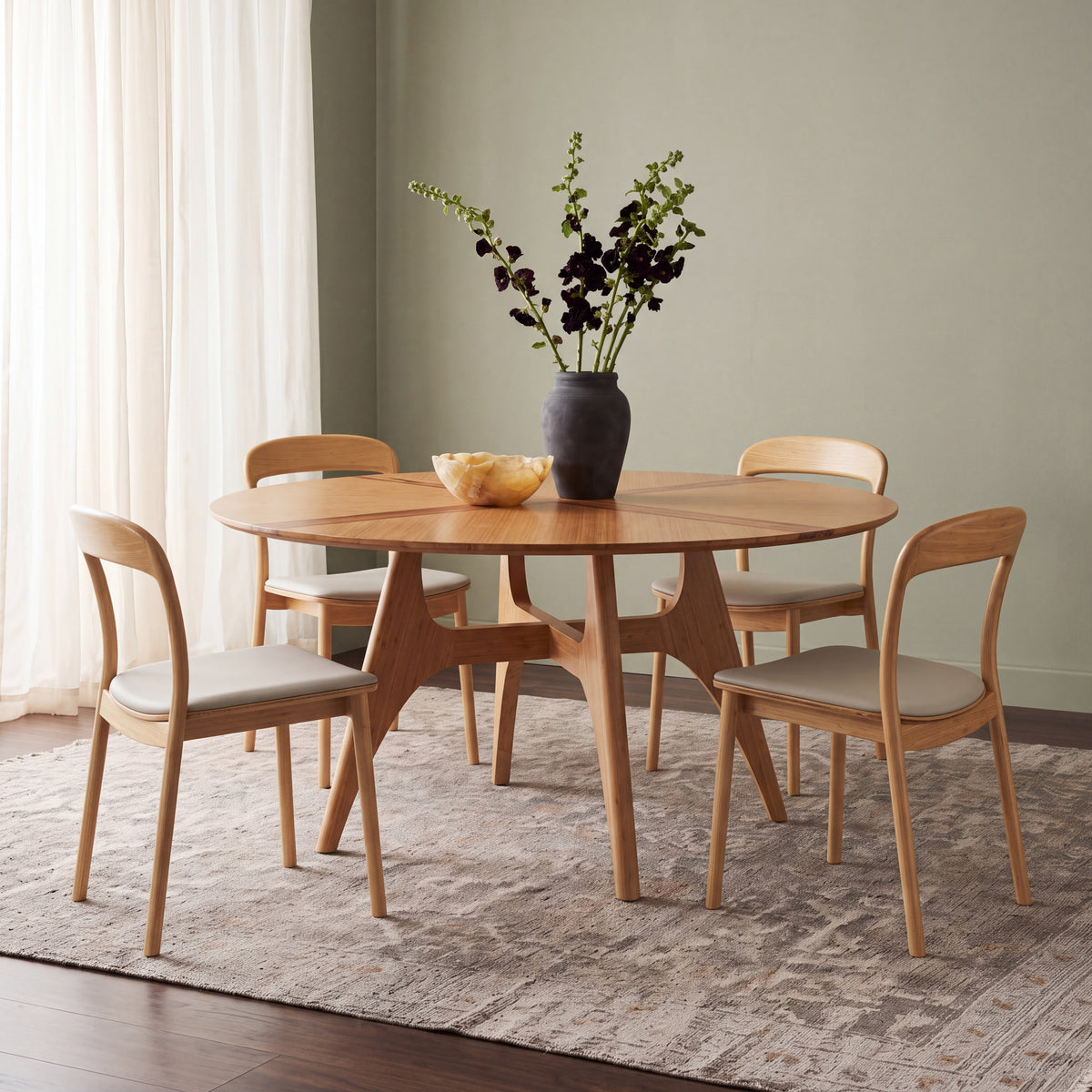 Greenington Suuri Dining Table in Caramelized bamboo, styled in a dining room