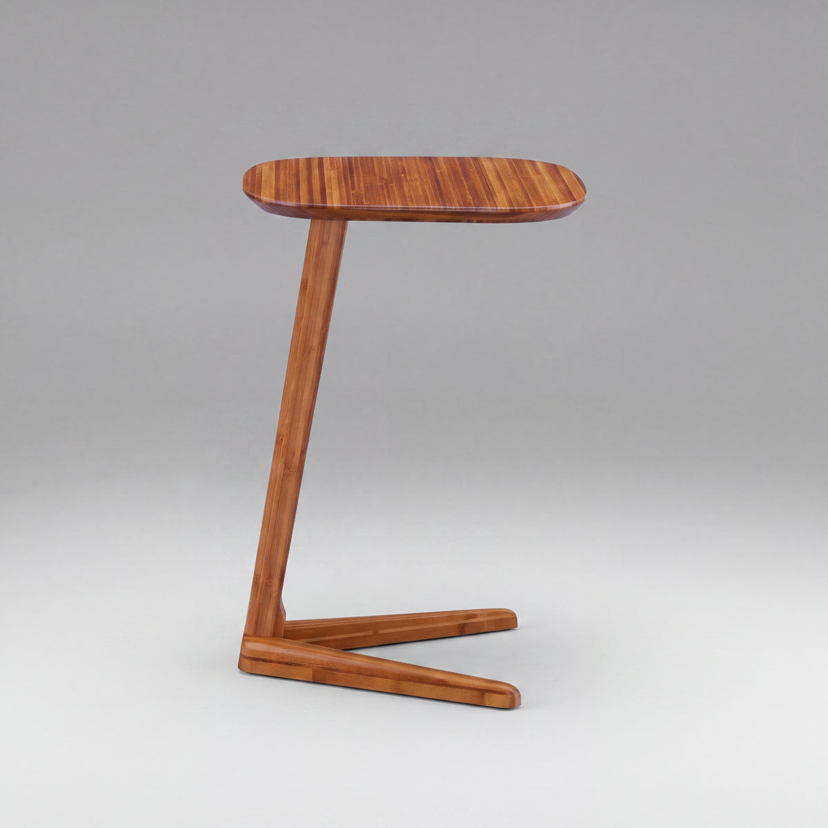 Greenington Thyme Side Table in Amber bamboo, shown on a plain background