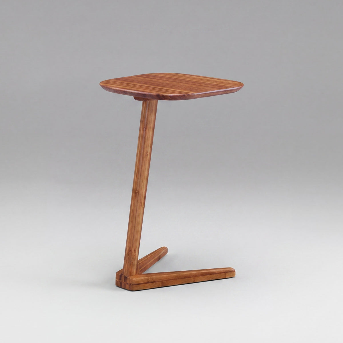Greenington Thyme Side Table in Amber bamboo, studio photo on a plain background