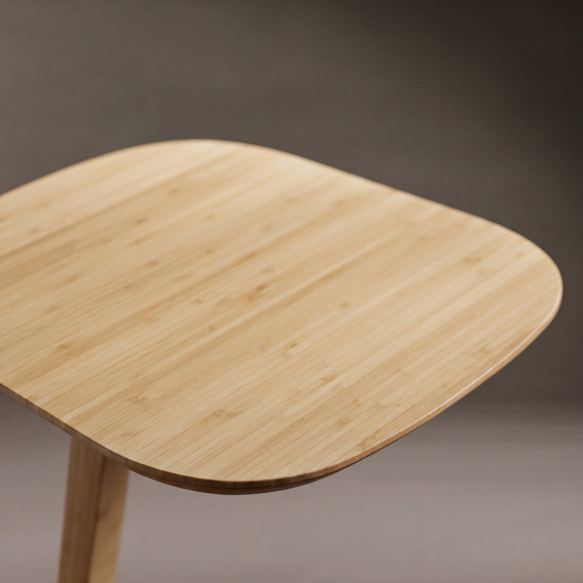 Close-up of the top and bamboo grain on the Greenington Thyme Side Table in Wheat bamboo