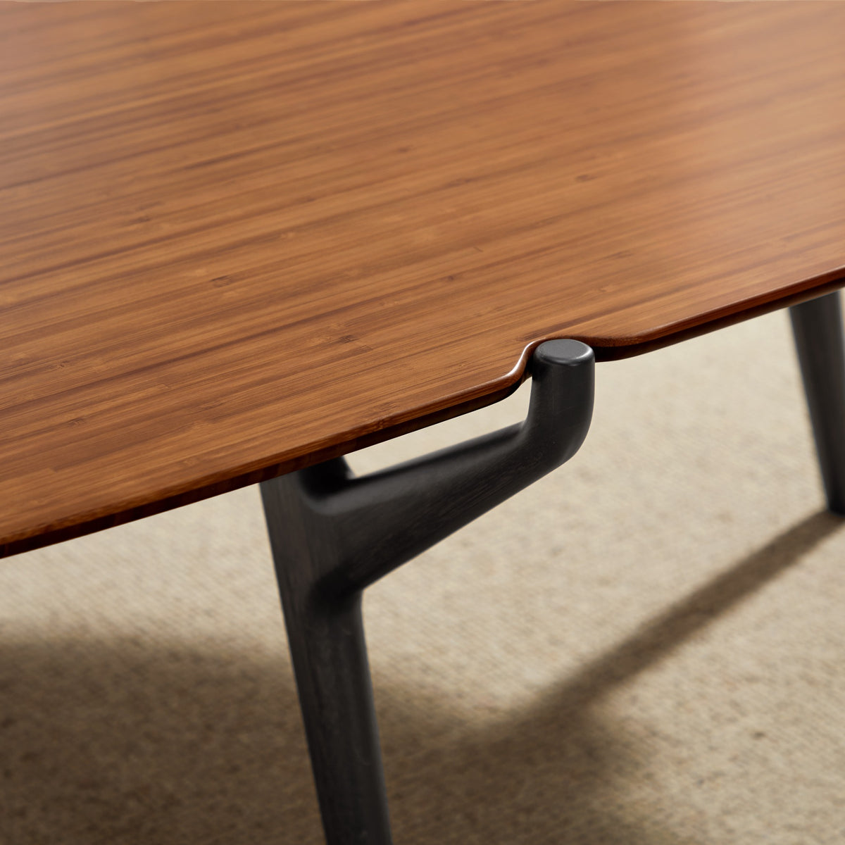 Detail of the leg on the Greenington Tofino Coffee Table in Amber bamboo