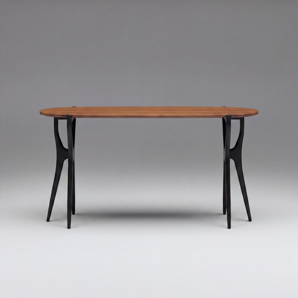 Greenington Tofino Console Table in Amber and Caviar bamboo, on a studio background