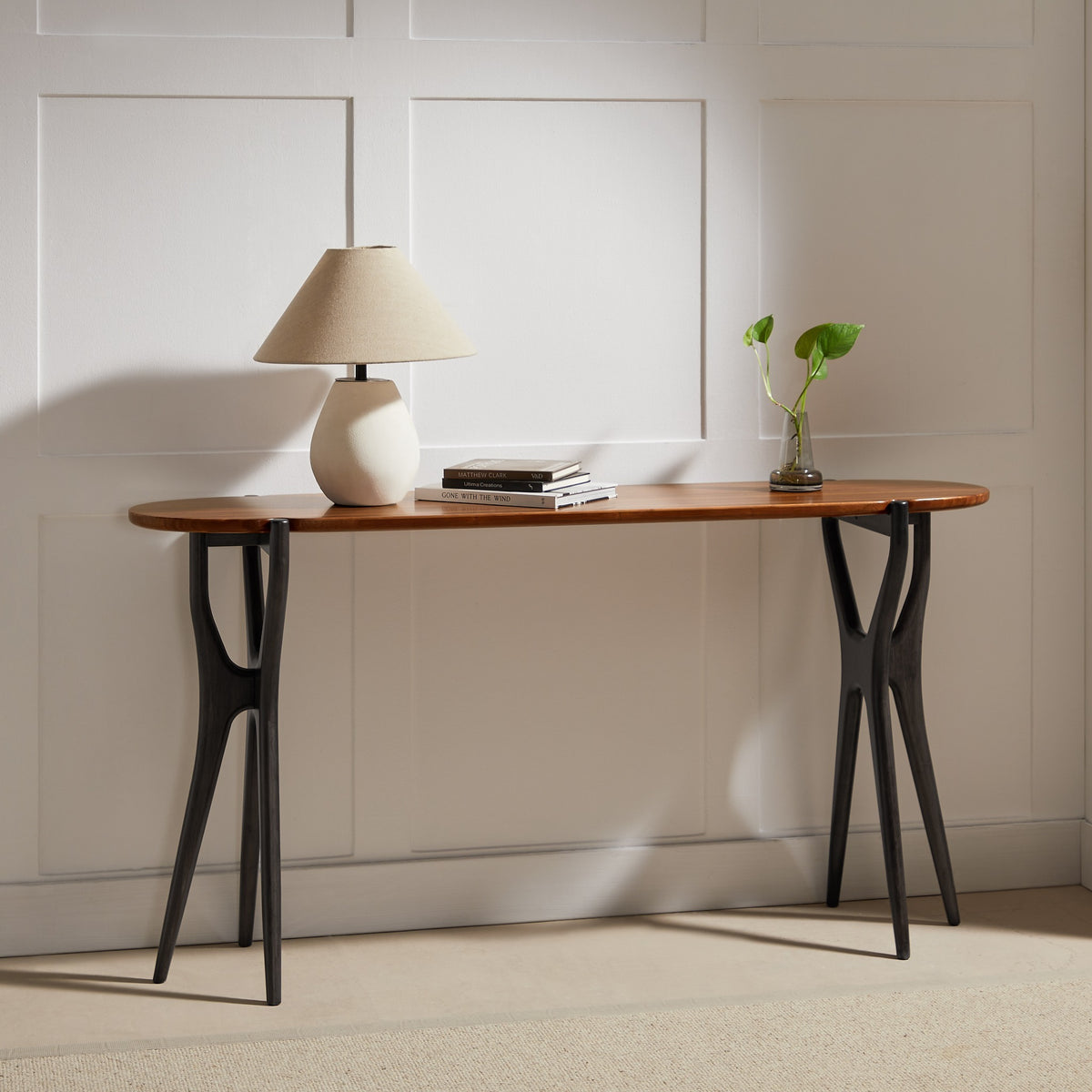 Greenington Tofino Console Table in Amber and Caviar bamboo, styled in a living room