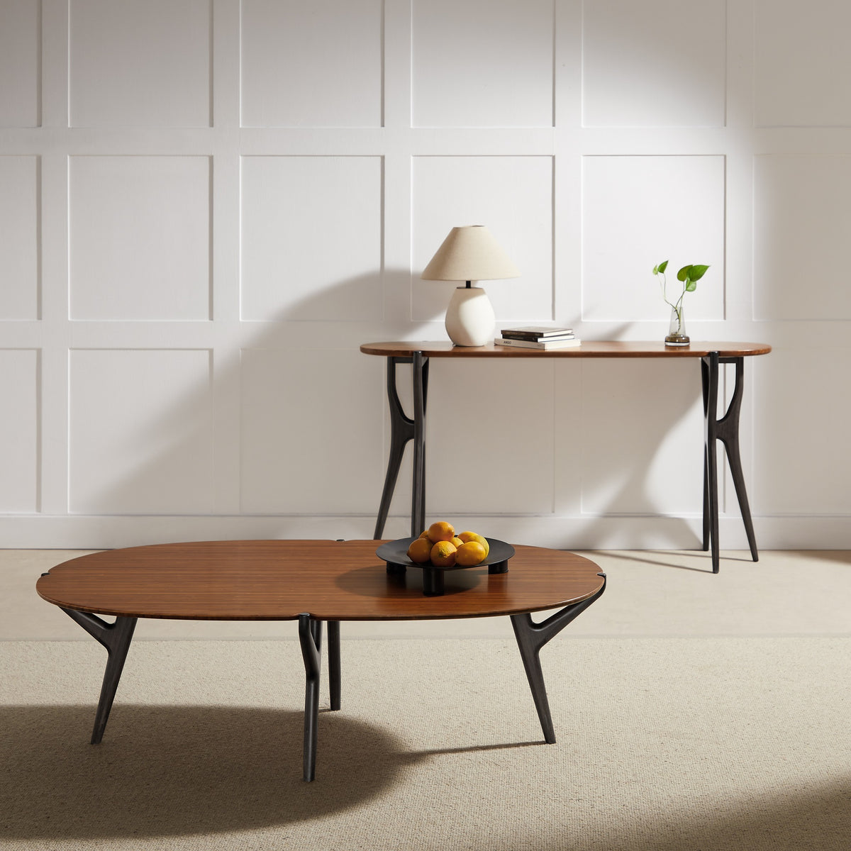 Greenington Tofino Console Table in Amber and Caviar bamboo, styled in a living room