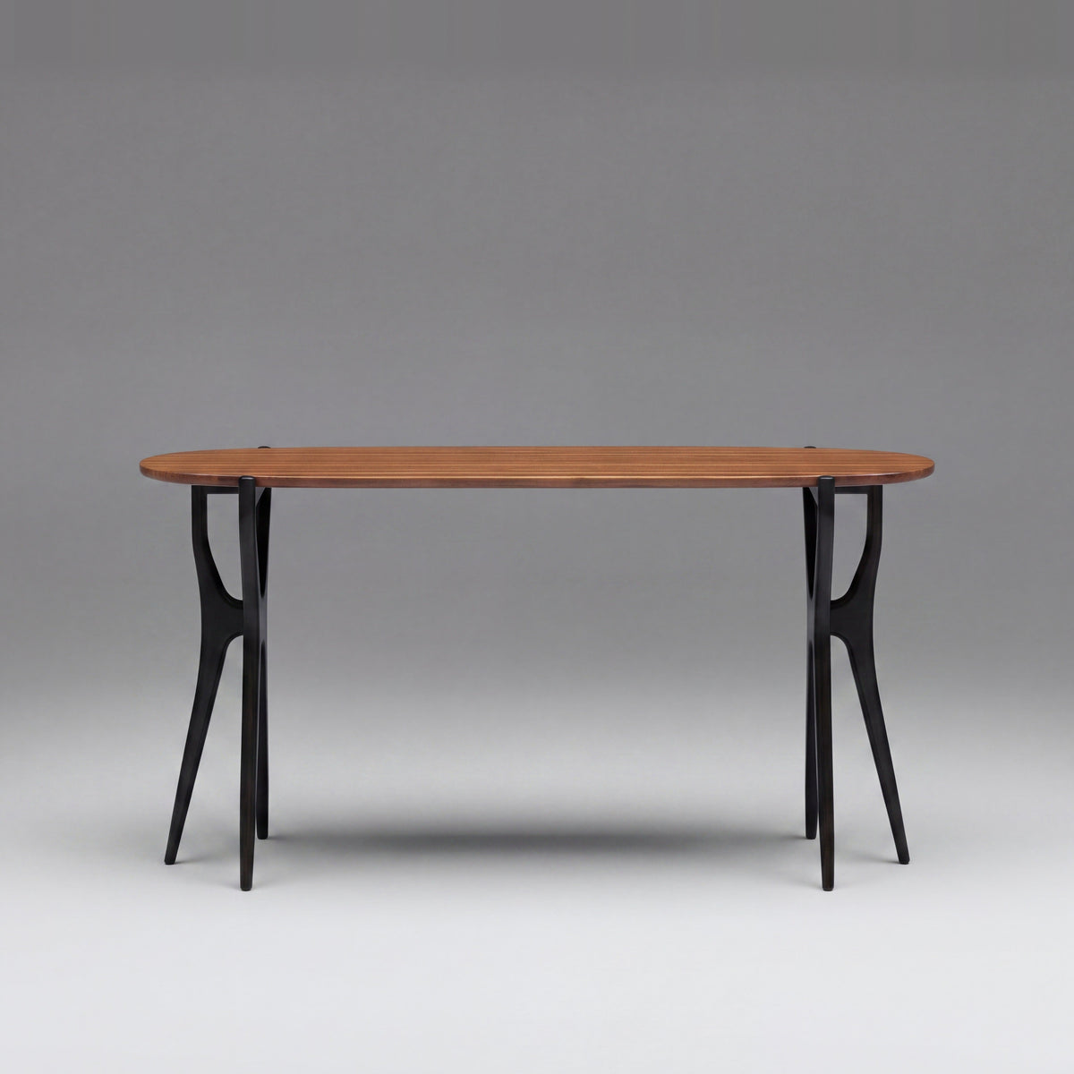Greenington Tofino Console Table in Amber and Caviar bamboo, on a studio background