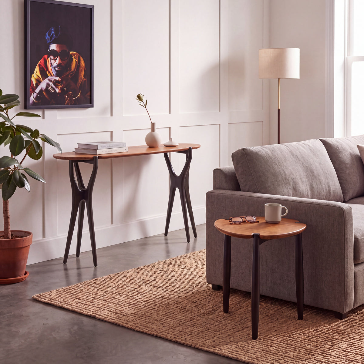 Greenington Tofino Console Table in Amber and Caviar bamboo, shown in a living room