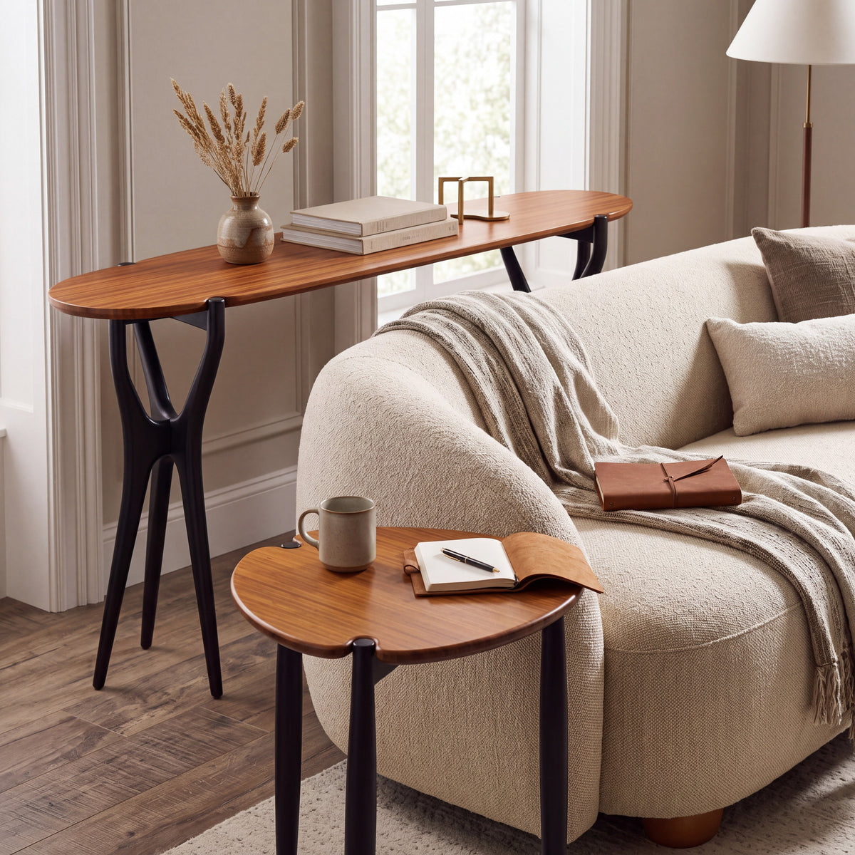 Greenington Tofino Console Table in Amber and Caviar bamboo, pictured in a living room