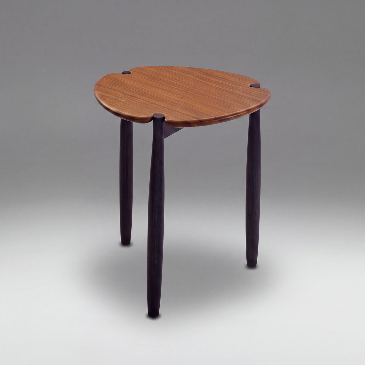 Greenington Tofino Side Table in Amber and Caviar bamboo, on a studio background