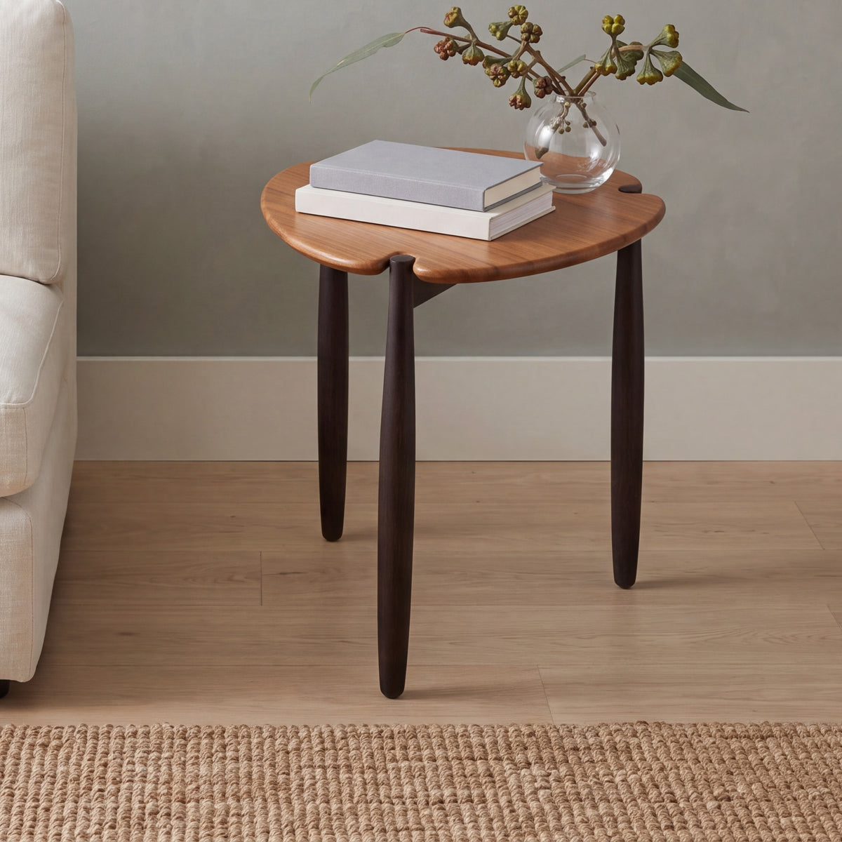 Greenington Tofino Side Table in Amber and Caviar bamboo, styled in a living room