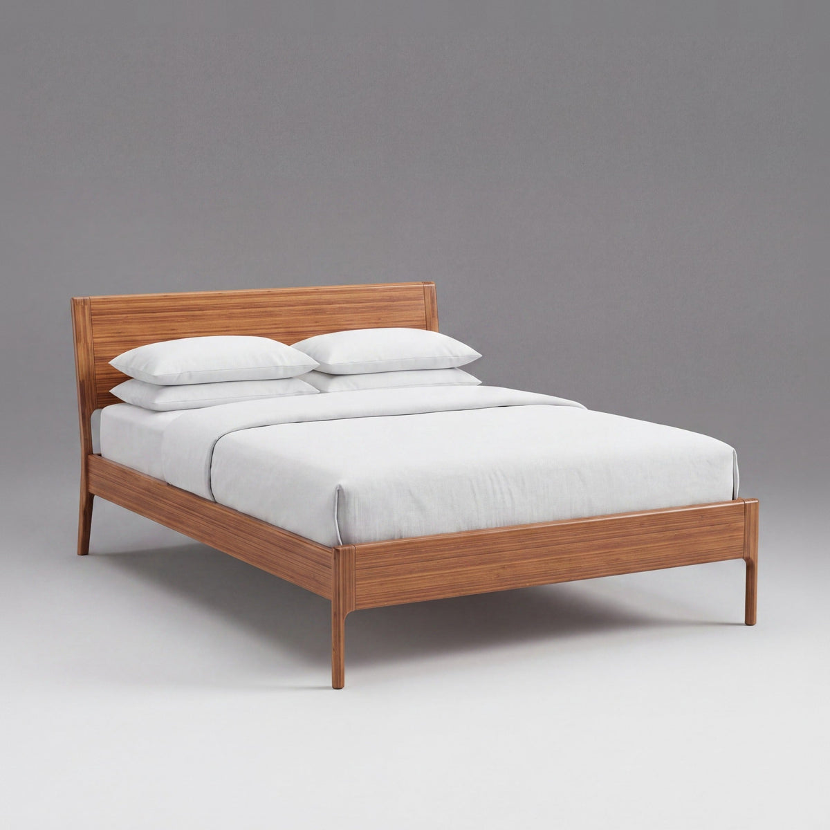 Greenington Ventura Platform Bed in Amber bamboo, on a studio background
