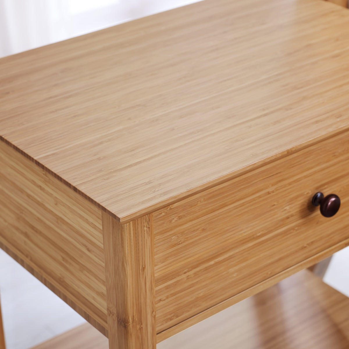 Close-up of the drawer and pull on the Greenington Willow Nightstand in Caramelized bamboo
