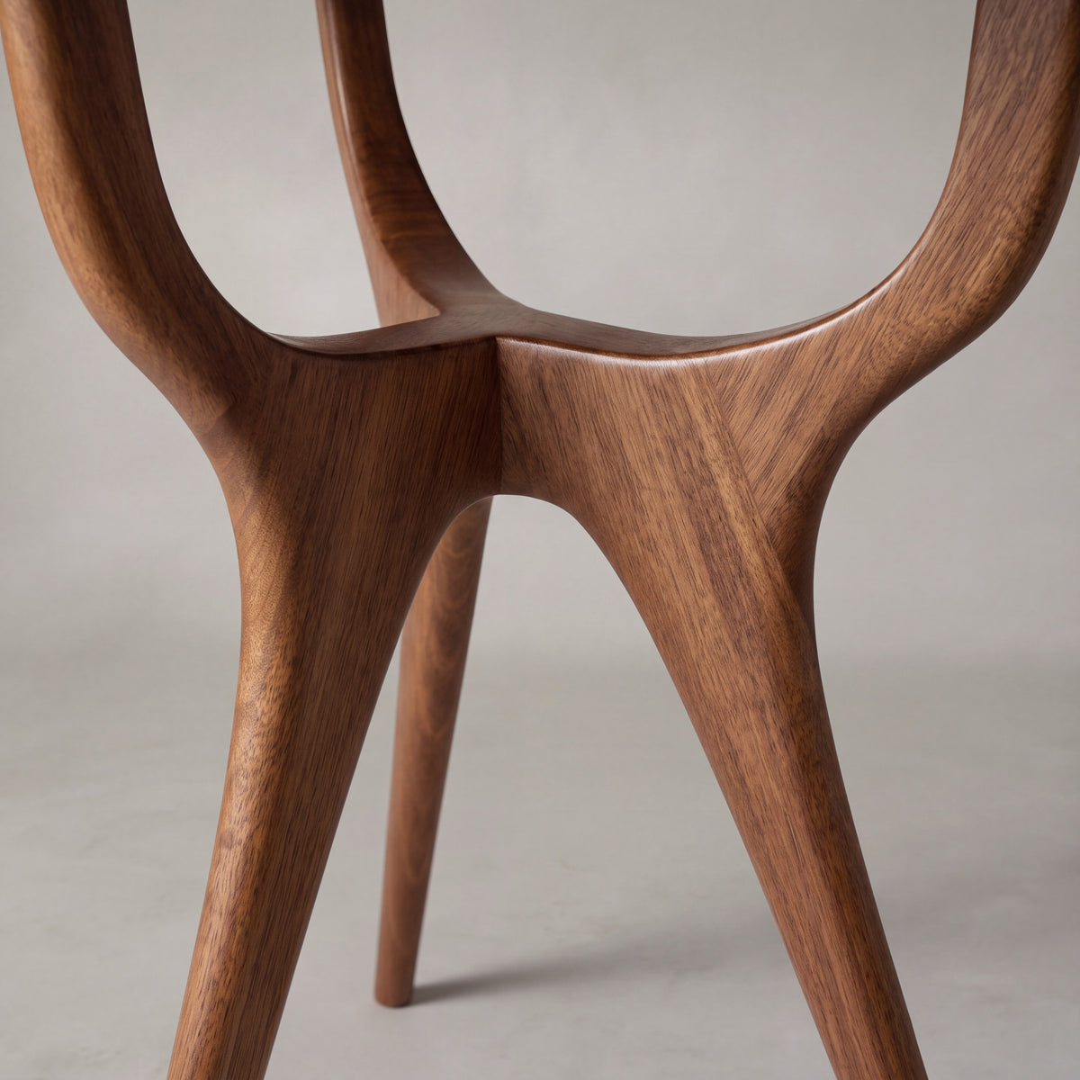 Close-up of the leg on the Greenington Wynn Writing Desk in Amber bamboo