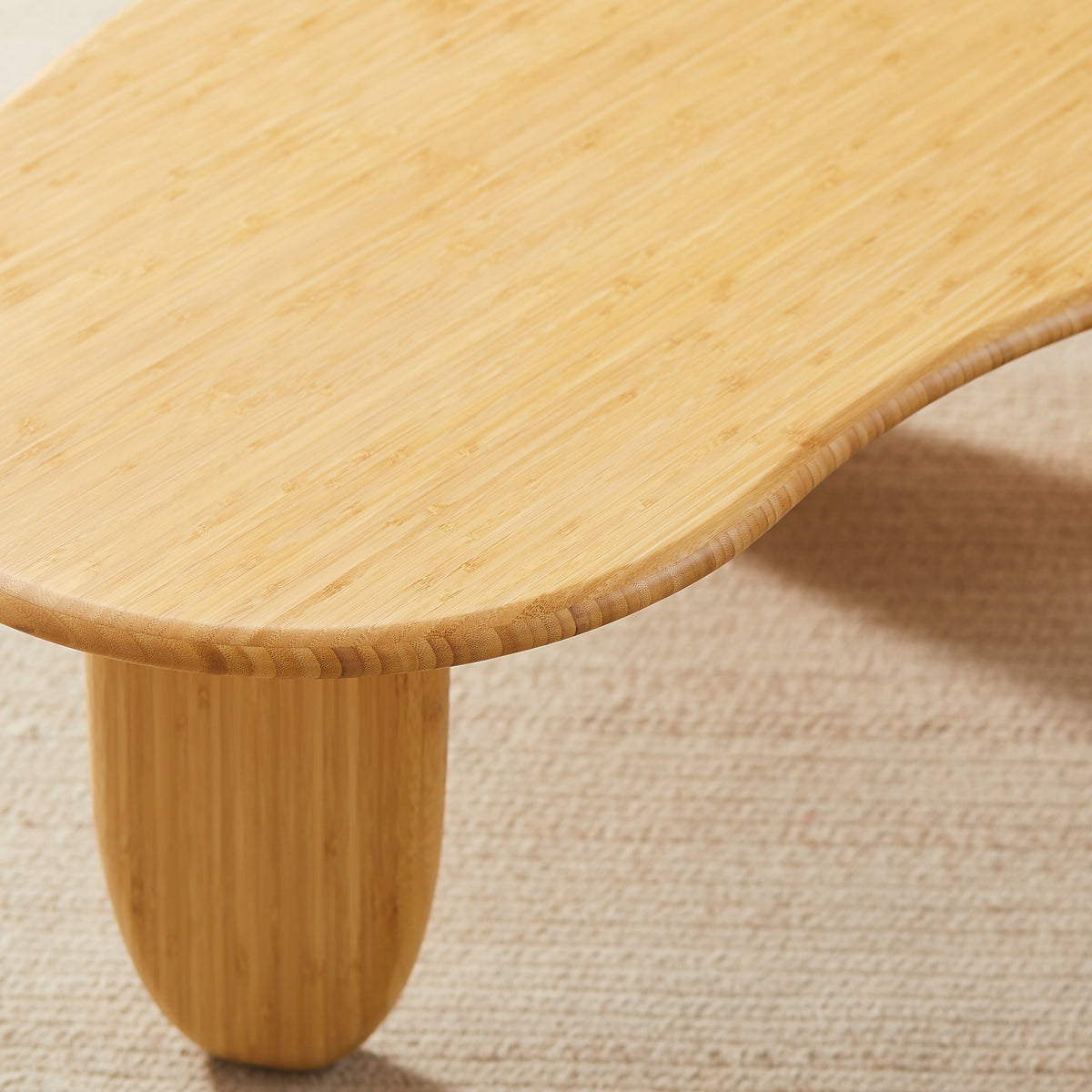 Close-up of the leg on the Greenington Zephyr Coffee Table in Wheat bamboo