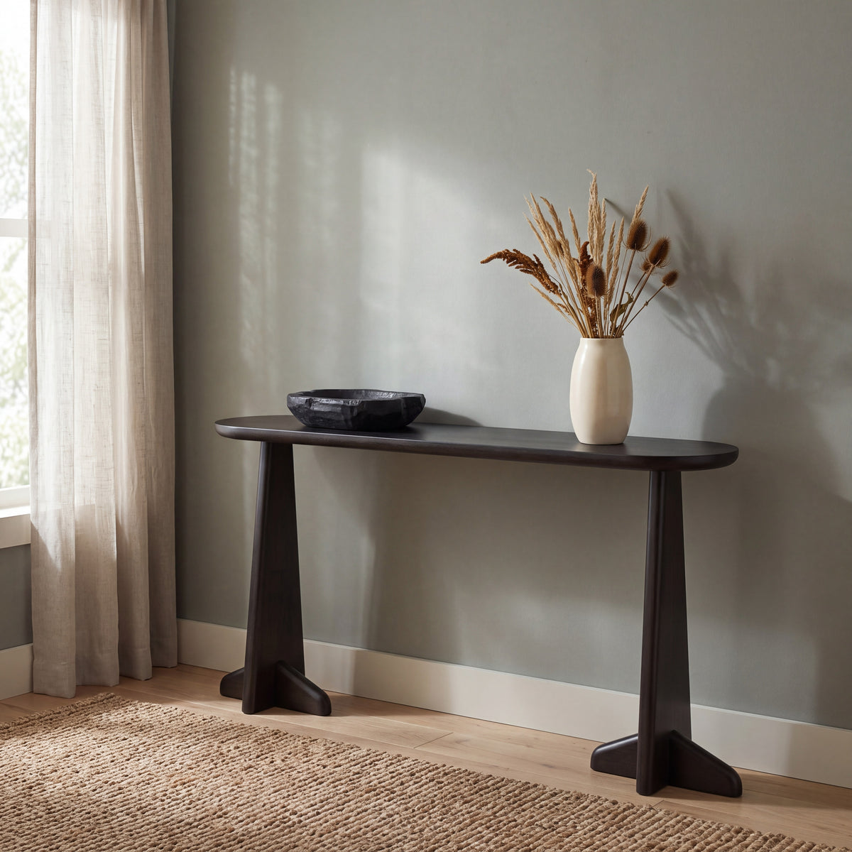 Greenington Zephyr Console Table in Caviar bamboo, in a living room setting